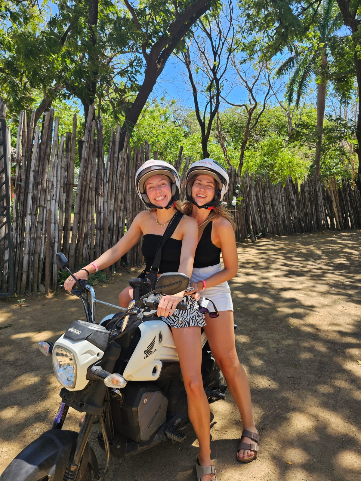 Happy travelers riding with Loco Rentals